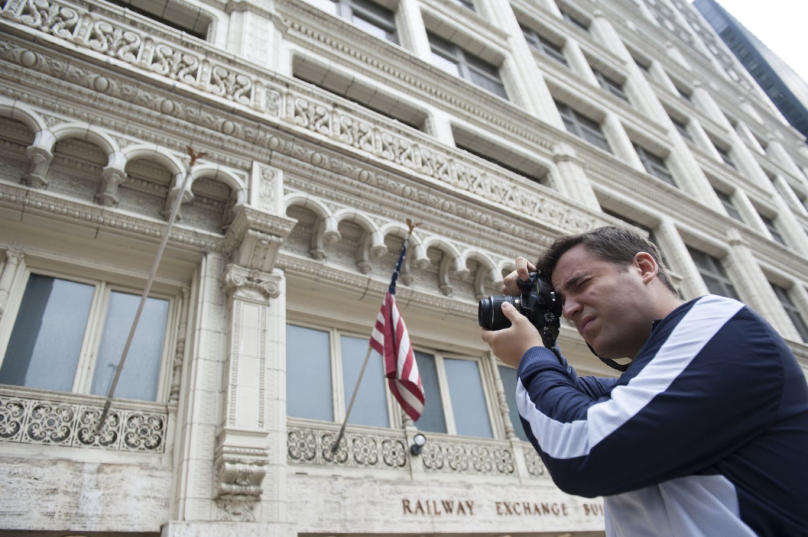WashU students photographing and studying the Railway Exchange in 2014